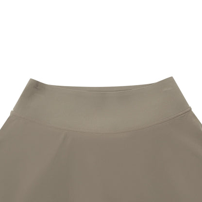 Jupe-short femme Li-Ning LN DRY taupe : gros plan sur la ceinture large et la couture de la taille haute