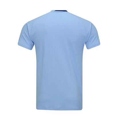 Maillot de pickleball Li-Ning Pro bleu ciel vu de dos, uni avec un liseré bleu roi à l'encolure