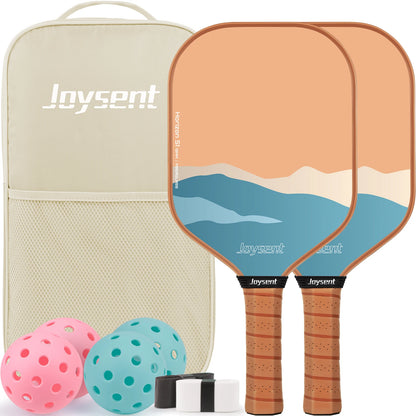 Pack de pickleball Joysent coloris abricot : deux raquettes à vagues bleues, grip terracotta, sac beige et balles