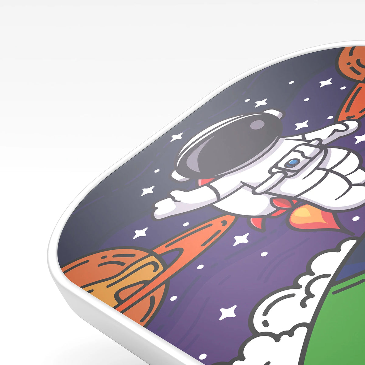 Raquette de pickleball enfant Joysent, gros plan sur le décor astronaute et le bord de protection blanc du tamis